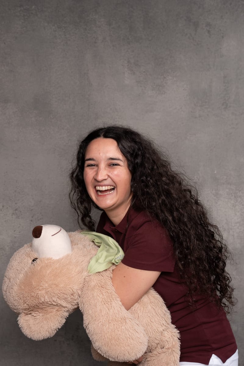 Anna Katharina, practice manager, with Klaus, the practice mascot
